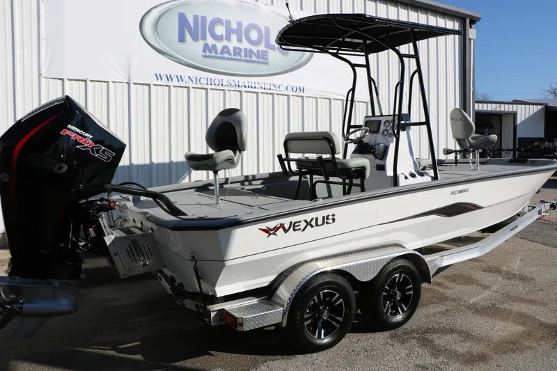Slide: The Image of 2025 Vexus ACX 2210 boat with Mercury Pro XS engine at Nichols Marine dealership. - 2