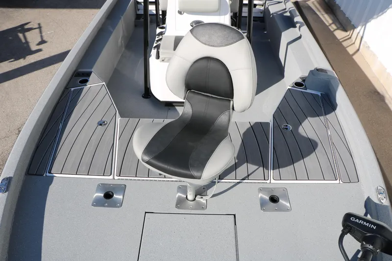 Slide: The Image of 2025 Vexus ACX 2210 boat interior with sleek seating and modern design. - 22