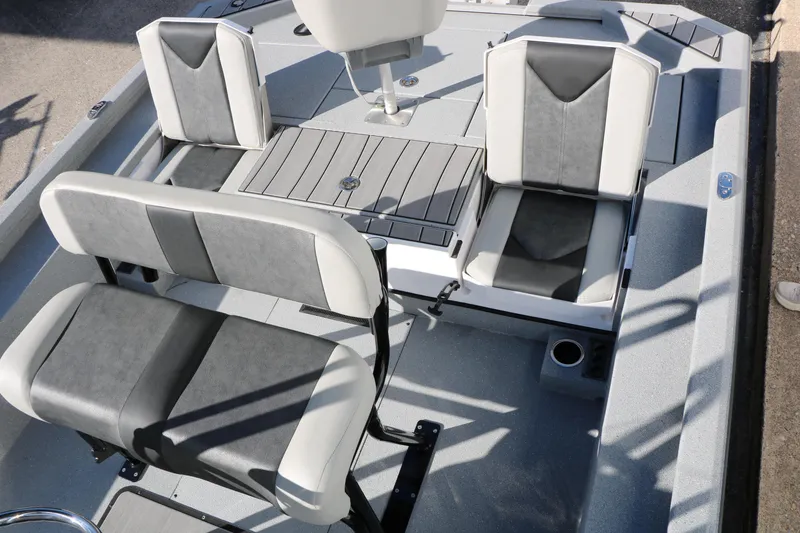 Slide: The Image of 2025 Vexus ACX 2210 boat interior with gray and white seating arrangement. - 25