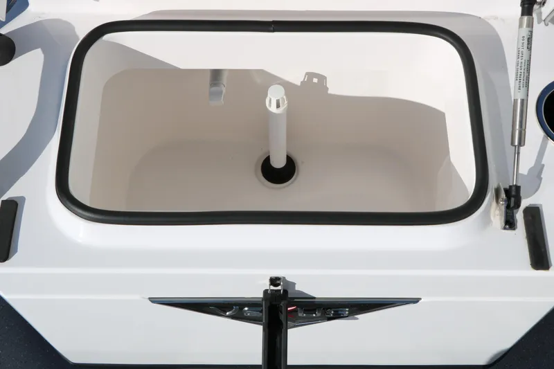 Slide: The Image of Livewell compartment of 2025 Vexus ACX 2210 boat, featuring a sleek design. - 30