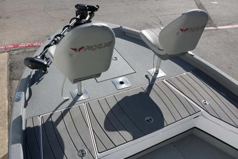 Slide: The Image of 2025 Vexus ACX 2210 boat deck with seating and trolling motor. - 33