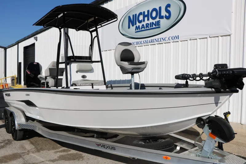 Slide: The Image of 2025 Vexus ACX 2210 boat on trailer at Nichols Marine dealership. - 7