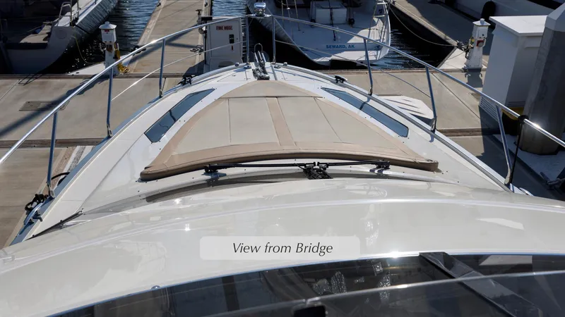 Slide: The Image of 2013 Marquis 500 Sport Bridge yacht at dock, view from bridge. - 11