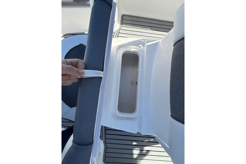 Slide: The Image of 2019 Tidewater 2700 Carolina Bay boat seat and storage compartment detail. - 32