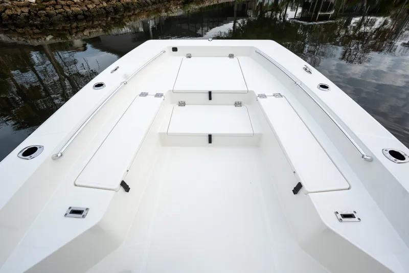 Slide: The Image of 2026 Bay Rider 2260 FS Skiff interior with seating and storage compartments. - 15