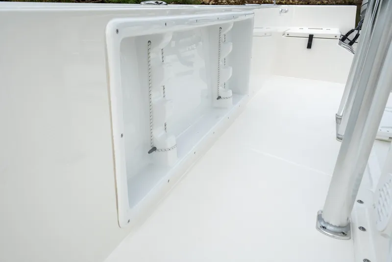 Slide: The Image of 2026 Bay Rider 2260 FS Skiff interior detail showcasing storage compartment and sleek design. - 24