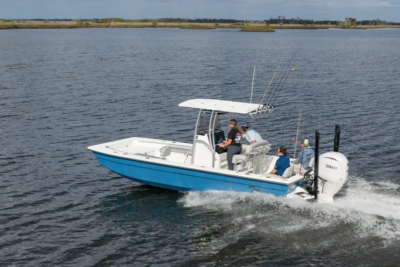 Slide: The Image of 2026 Bay Rider 2260 FS Skiff cruising on open water with passengers. - 3