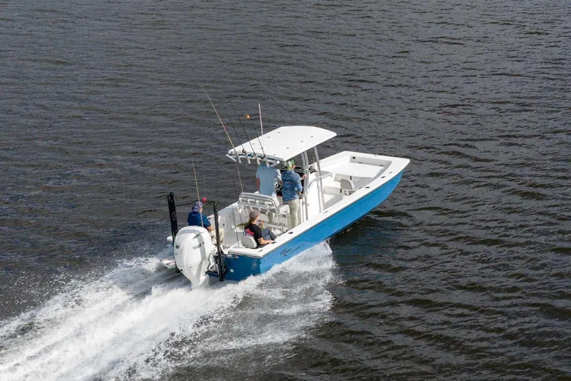 Slide: The Image of 2026 Bay Rider 2260 FS Skiff cruising on open water with passengers. - 4