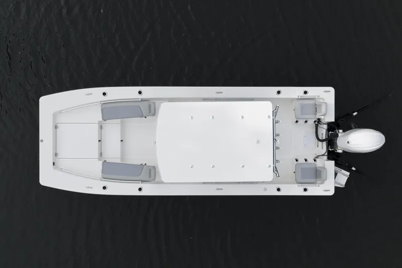 Slide: The Image of 2026 Bay Rider 2260 FS Skiff, aerial view, sleek design on dark water. - 6