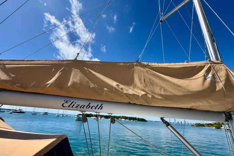Slide: The Image of Sailboat "Elizabeth" on water, Beneteau Oceanis 40, 2008 model, clear blue sky. - 10
