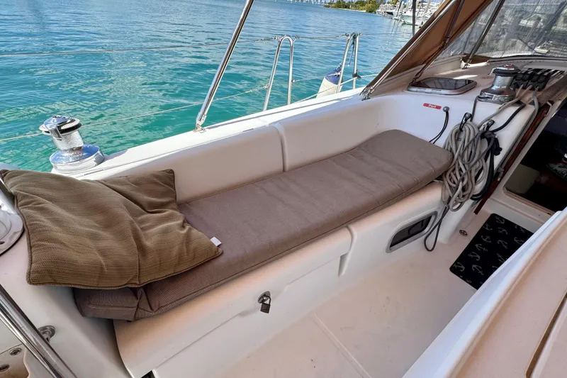 Slide: The Image of Cozy seating area on a 2008 Beneteau Oceanis 40 sailboat with scenic water view. - 19