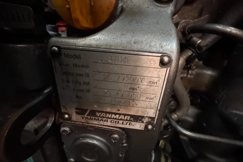 Slide: The Image of Yanmar engine plate on a 2008 Beneteau Oceanis 40 sailboat, model 3JH4E. - 31