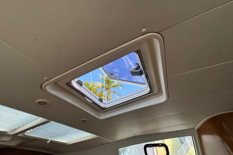 Slide: The Image of Interior view of 2008 Beneteau Oceanis 40 yacht with open ceiling hatch. - 43