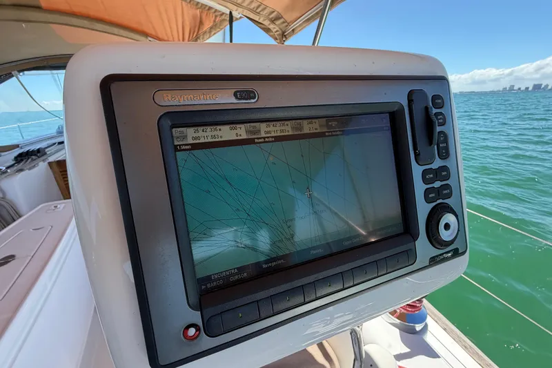 Slide: The Image of Navigation system on a 2008 Beneteau Oceanis 40 sailboat, displaying marine coordinates. - 56