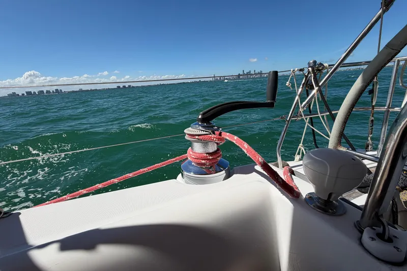 Slide: The Image of Sailing on a 2008 Beneteau Oceanis 40 with city skyline in the background. - 58