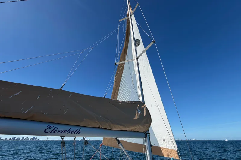 Slide: The Image of Sailing on a 2008 Beneteau Oceanis 40 with clear blue skies and city skyline. - 63
