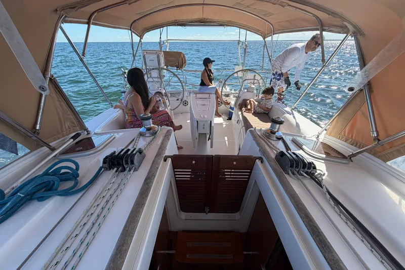 Slide: The Image of Family enjoying a day on a 2008 Beneteau Oceanis 40 sailboat. - 65