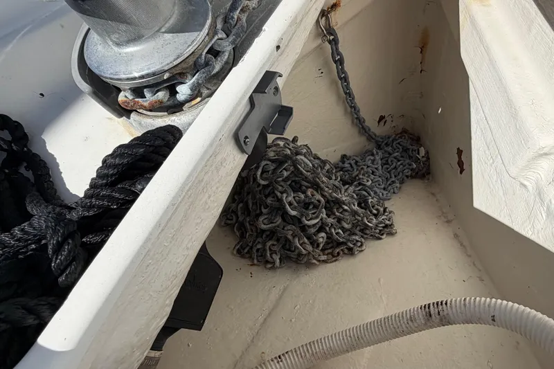 Slide: The Image of Anchor chain and rope in the bow of a 2008 Beneteau Oceanis 40 sailboat. - 68