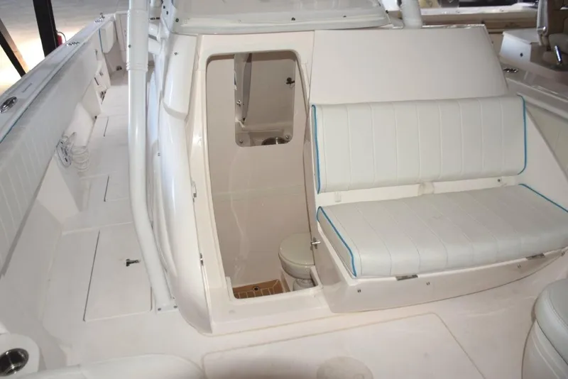 Slide: The Image of Seat on front of console with built in cooler beneath seat. - 11