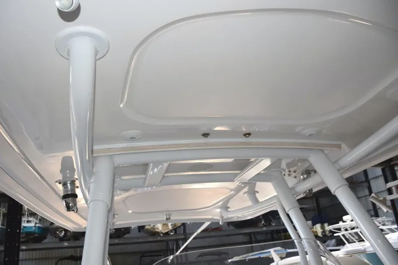 Slide: The Image of Electric anchor windlass with safety lanyard and thru-hull chute - stainless claw anchor, chain lead and nylon rode. Switches here and at helm. - 18