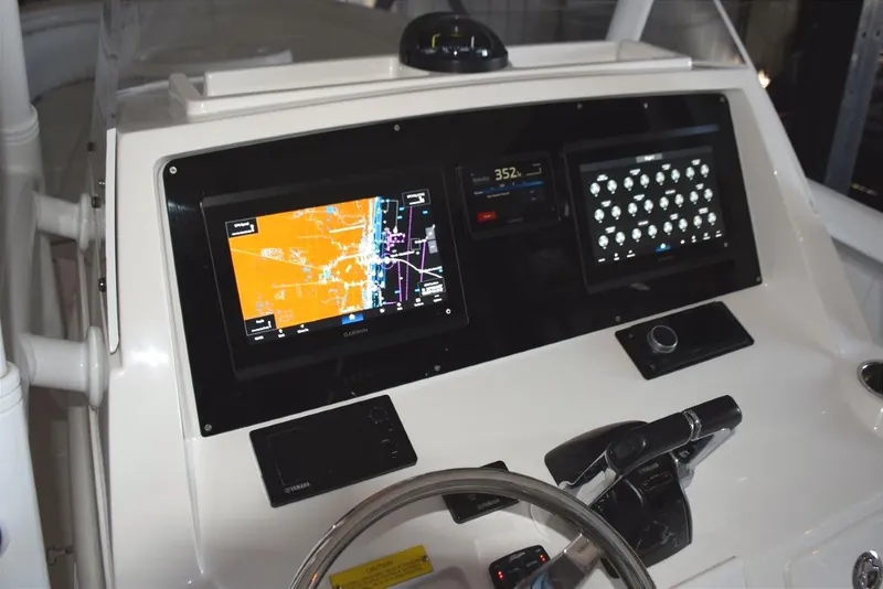 Slide: The Image of Magnetic compass on top of helm, Fusion stereo to starboard. - 36