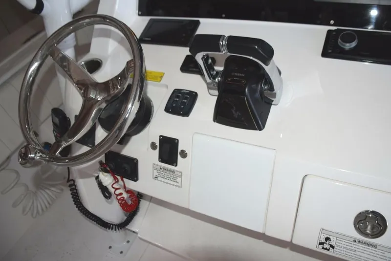 Slide: The Image of Tiltable helm wheel Yamaha control binnacle and digital engine display, bow thruster and trim tab controls. - 37