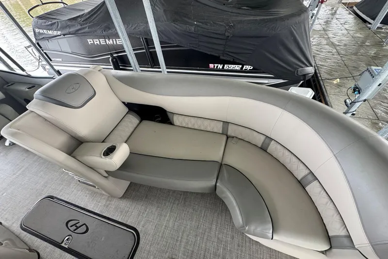 Slide: The Image of Luxurious seating on 2020 Harris Grand Mariner 250 pontoon boat, featuring elegant gray upholstery. - 11
