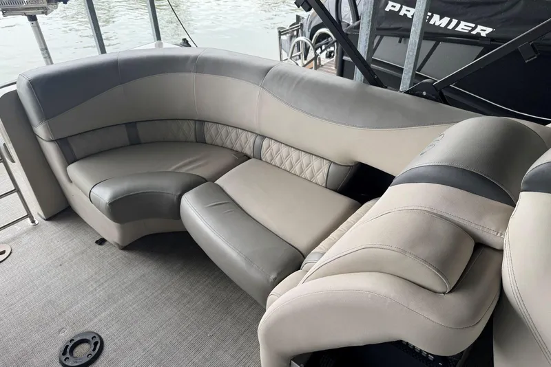 Slide: The Image of 2020 Harris Grand Mariner 250 boat interior with luxurious seating and elegant design. - 22