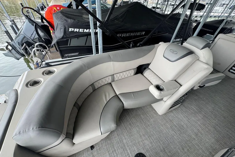 Slide: The Image of Luxurious seating on 2020 Harris Grand Mariner 250 pontoon boat with cup holders. - 24