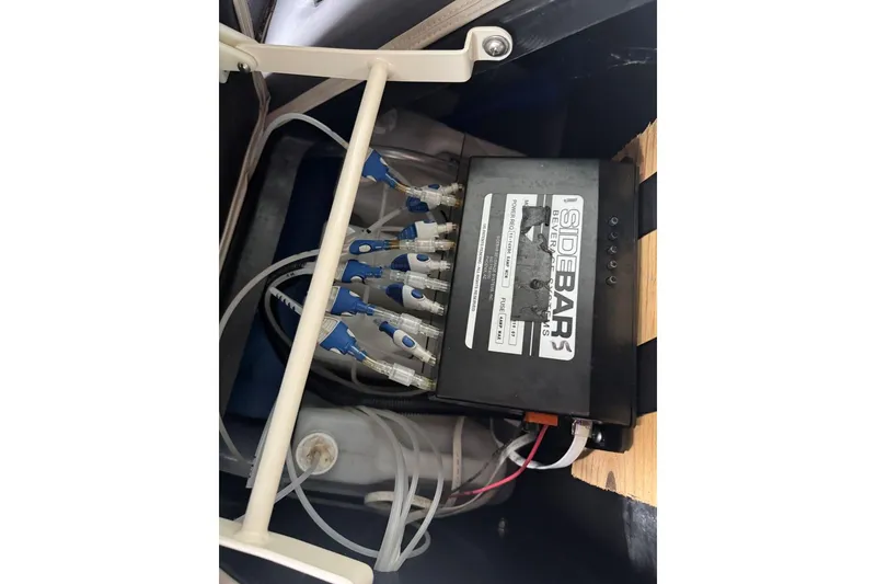 Slide: The Image of Control panel with wiring in a 2020 Harris Grand Mariner 250 boat. - 29