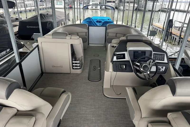 Slide: The Image of 2020 Harris Grand Mariner 250 pontoon boat interior with modern helm and seating. - 31