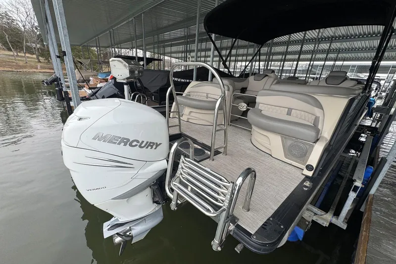 Slide: The Image of 2020 Harris Grand Mariner 250 pontoon boat with Mercury outboard engine in dock. - 6