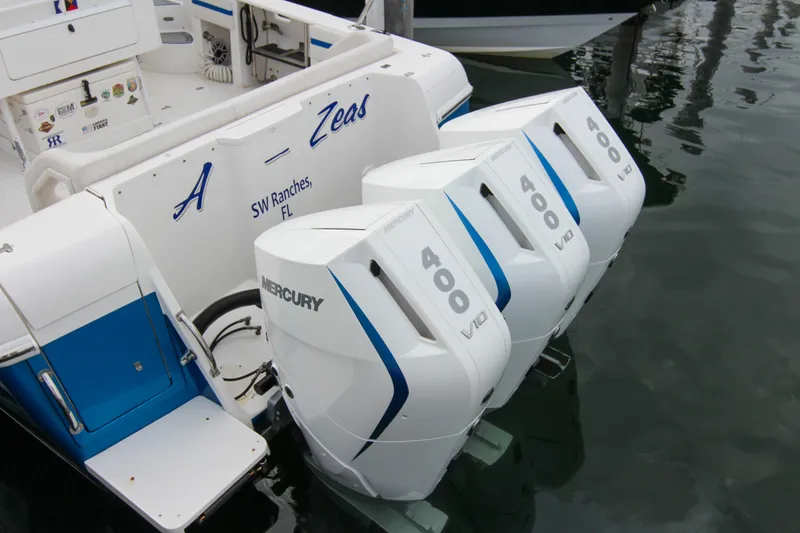 Slide: The Image of 2003 Intrepid 377 Walkaround with triple Mercury 400 V10 engines docked in SW Ranches, FL. - 13