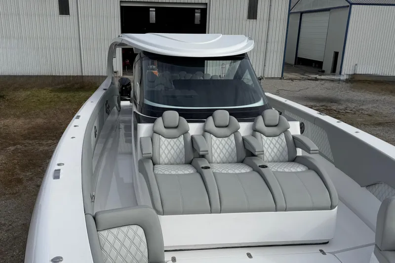 Slide: The Image of 2023 Mystic Powerboats M5200 luxury seating, featuring sleek design and premium upholstery. - 20