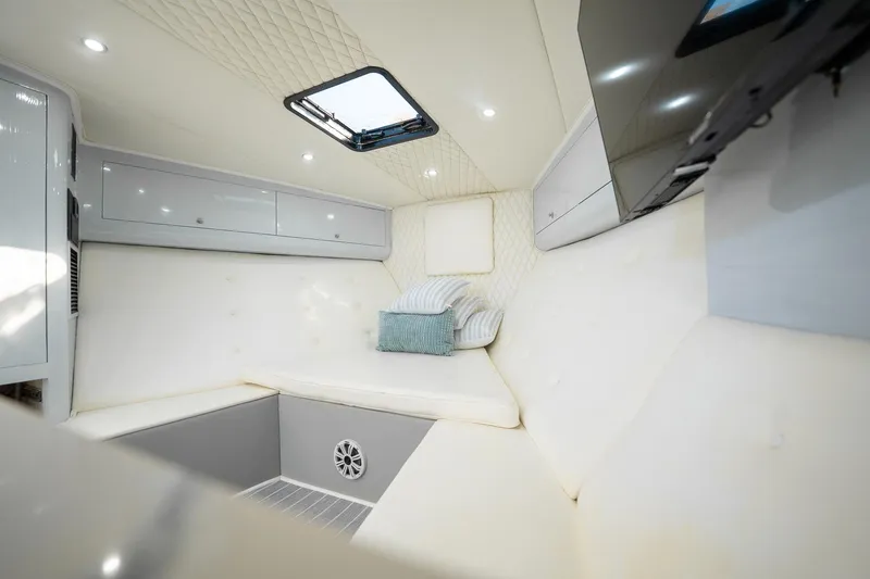 Slide: The Image of Luxurious interior of 1997 Strike 42 Express boat with plush seating and modern amenities. - 20