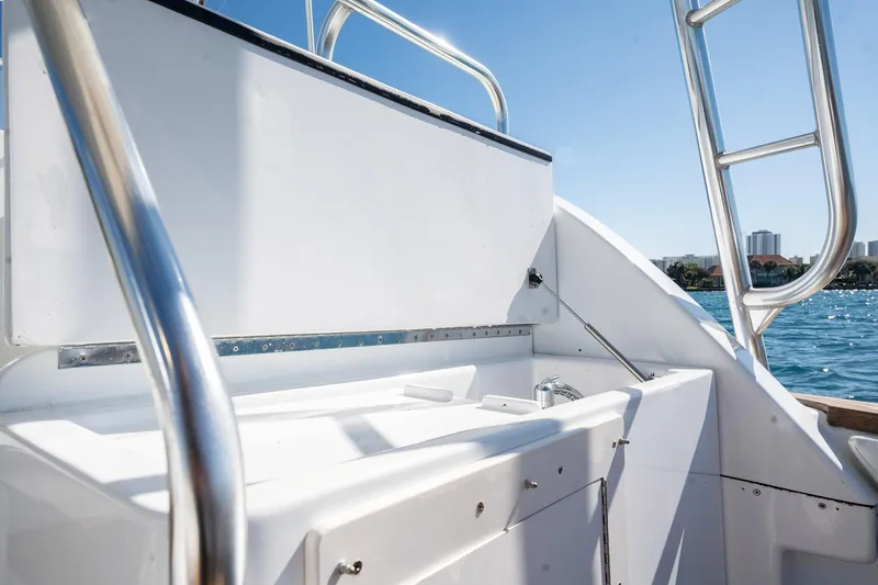 Slide: The Image of 1997 Strike 42 Express boat deck with stainless steel railings and ocean view. - 36