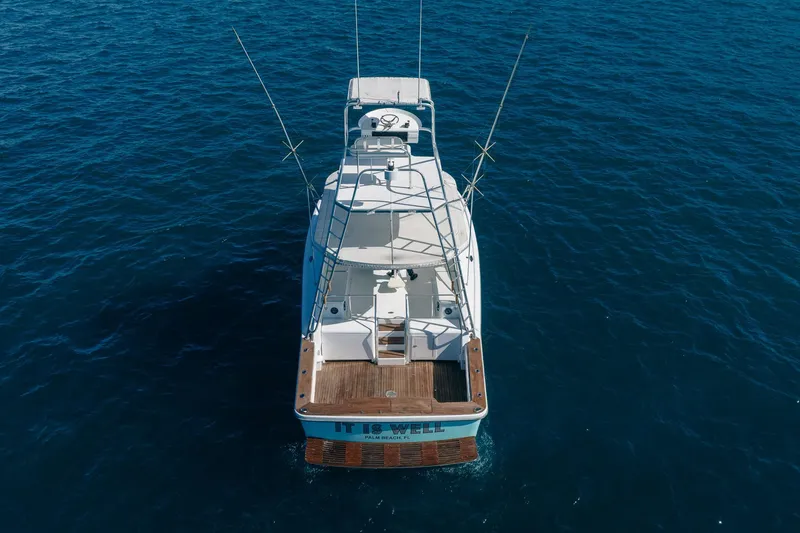 Slide: The Image of Aerial view of 1997 Strike 42 Express boat on open water. - 6