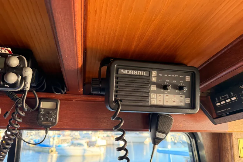 Slide: The Image of 1965 Custom Trawler interior with vintage Seahail communication equipment and control panel. - 38