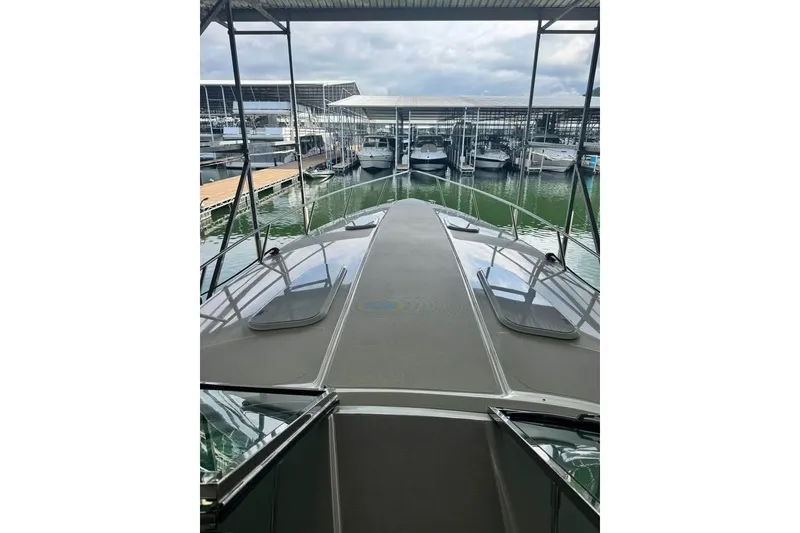 Slide: The Image of 2003 Formula 400 Super Sport yacht docked at marina, viewed from bow. - 5