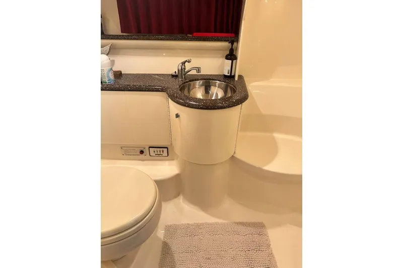 Slide: The Image of Bathroom interior of 2003 Formula 400 Super Sport yacht with sink and toilet. - 9