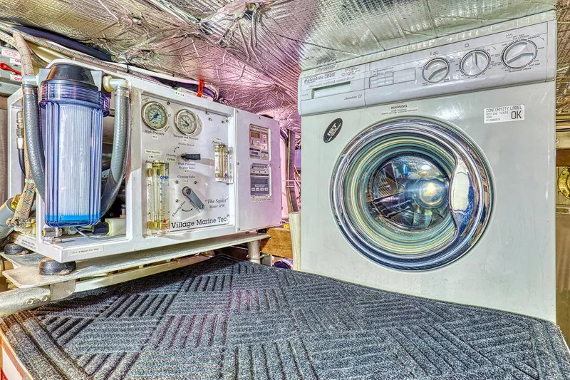 Slide: The Image of Washing machine and water filtration system in a 1926 Hacker-Craft boat. - 27