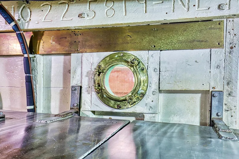Slide: The Image of Interior view of a 1926 Hacker-Craft Bridge Deck with porthole. - 29