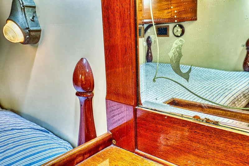 Slide: The Image of Interior of a 1926 Hacker-Craft Bridge Deck boat with wood accents. - 33