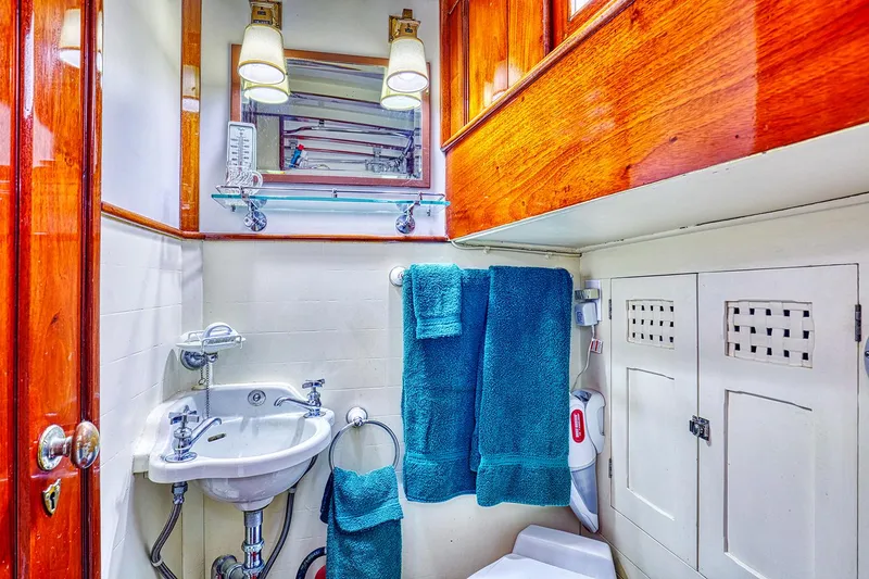 Slide: The Image of Luxurious bathroom in a 1926 Hacker-Craft Bridge Deck boat. - 35