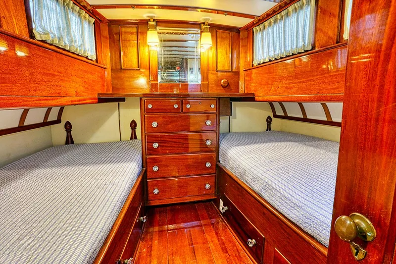 Slide: The Image of 1926 Hacker-Craft Bridge Deck interior with wooden furnishings. - 37