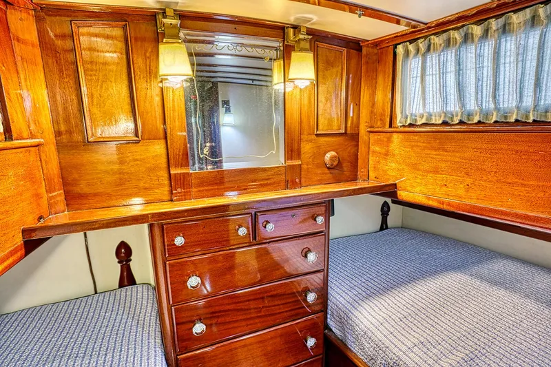 Slide: The Image of 1926 Hacker-Craft Bridge Deck interior with wooden furnishings. - 38