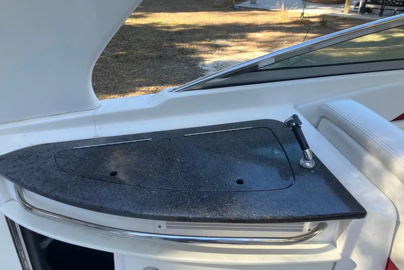 Slide: The Image of 2015 Chaparral 287 SSX boat interior with sleek countertop and faucet. - 14