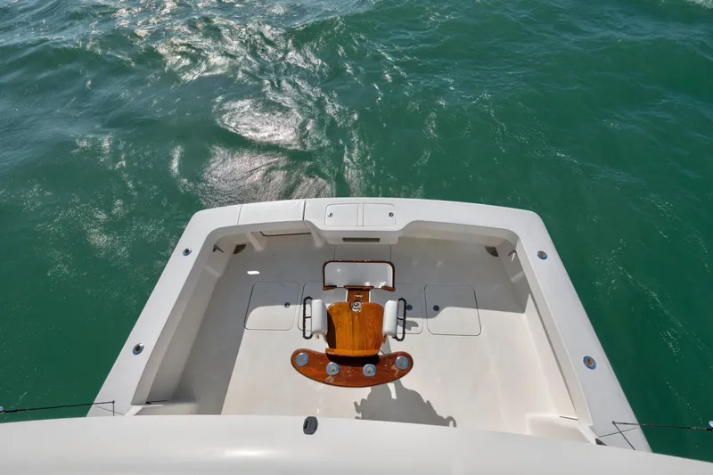 Slide: The Image of 2008 Viking Convertible boat deck overlooking ocean waters. - 21