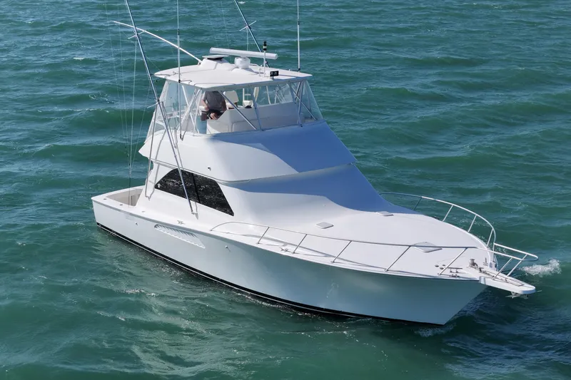 Slide: The Image of 2008 Viking Convertible yacht cruising on open water. - 4