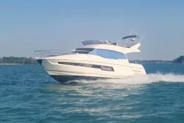 The Image of 2018 Prestige 460 yacht cruising on open water. - 0